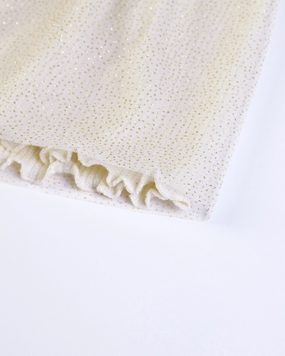 Crèmekleurig gebreid tule jurkje