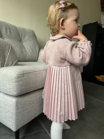 Roze gebreid plooi jurkje