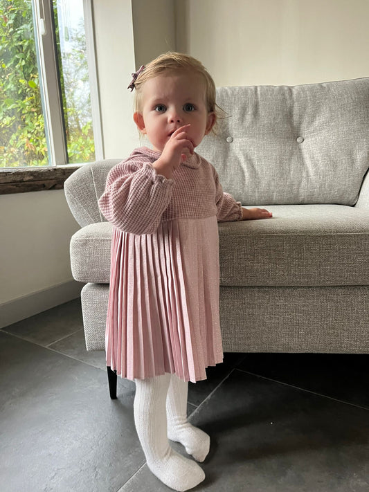 Roze gebreid plooi jurkje